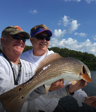 Tarpon fish jumping out of water